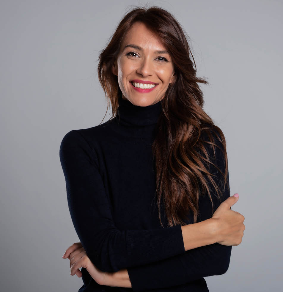 Woman smiling whilst posing