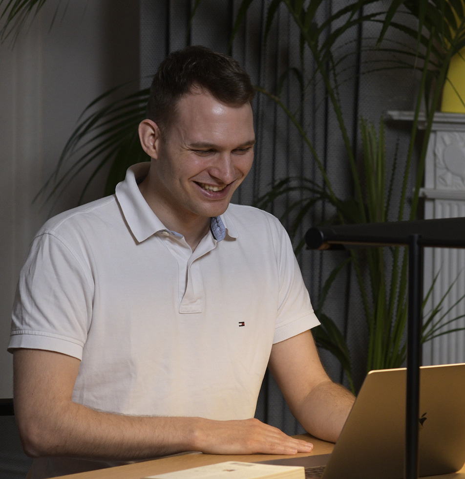 Man typing on laptop