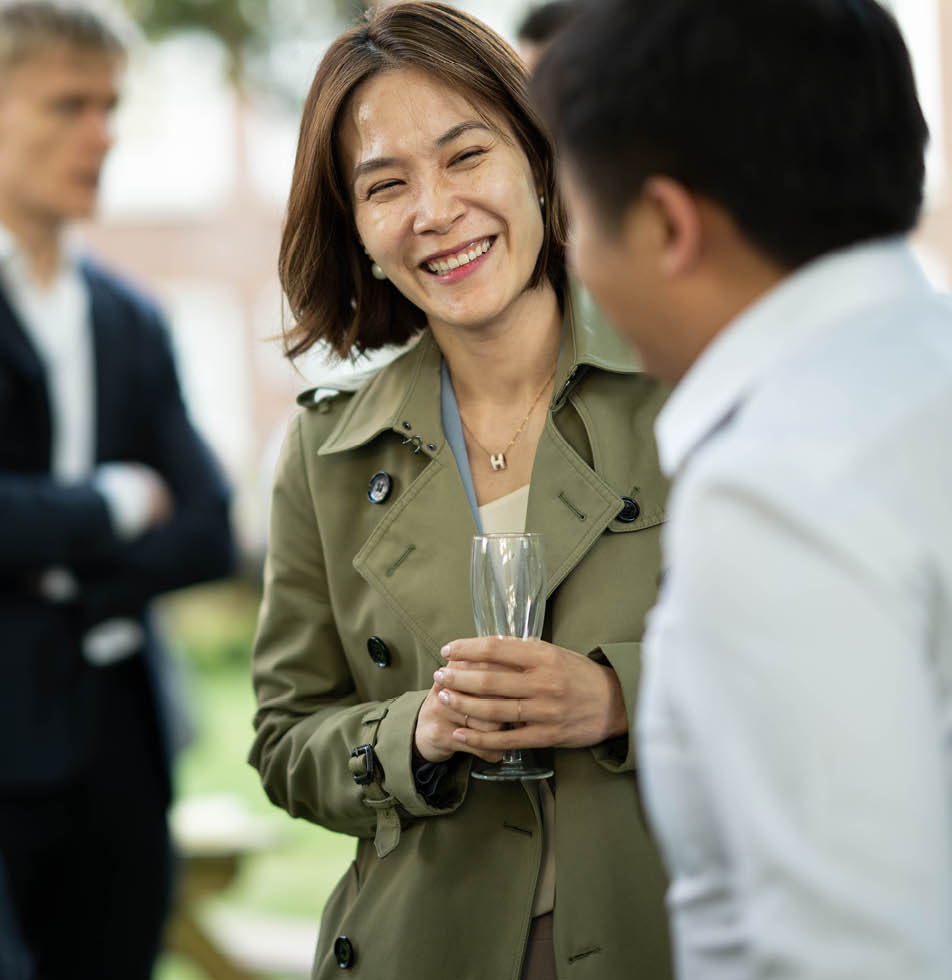 Woman smiling at man