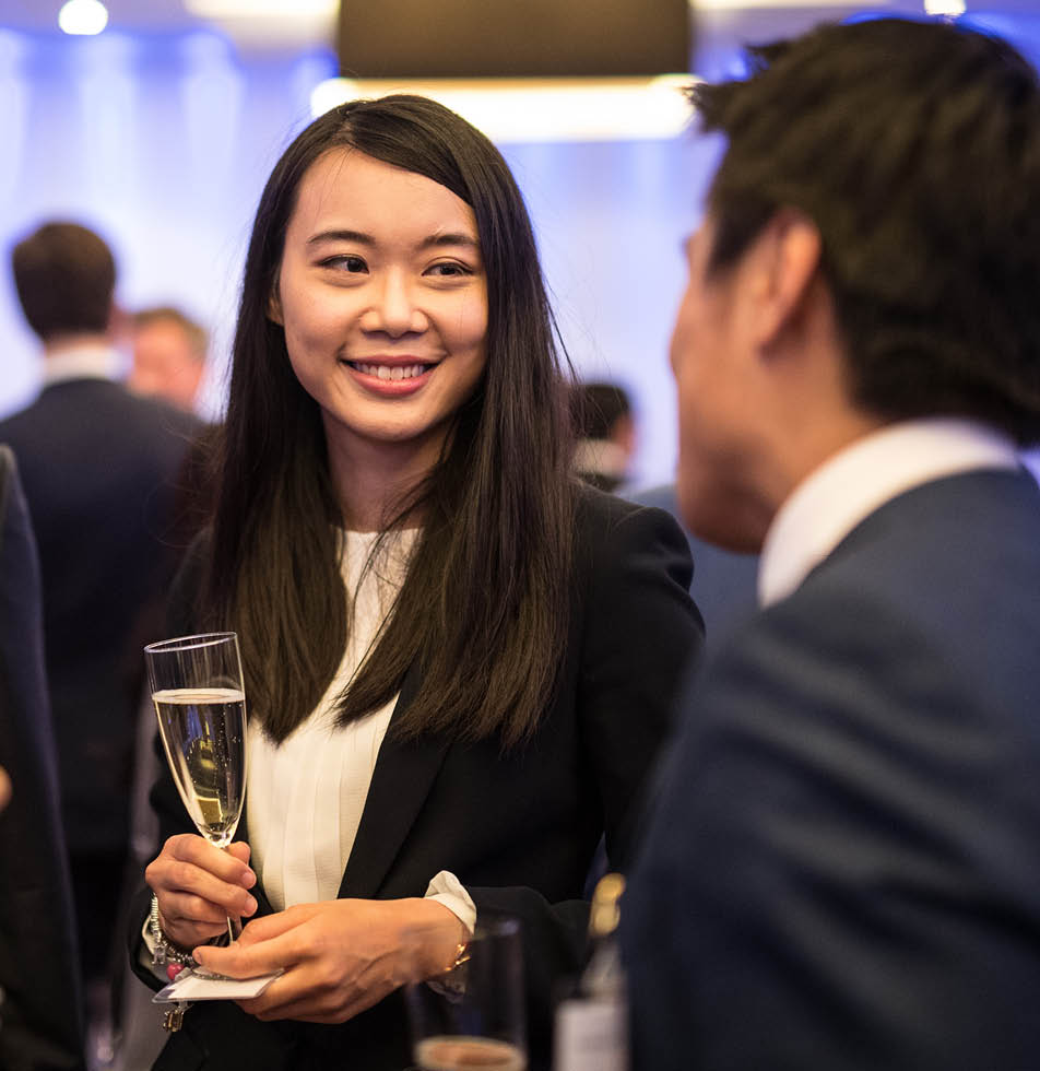 woman smiling engage in a conversation 