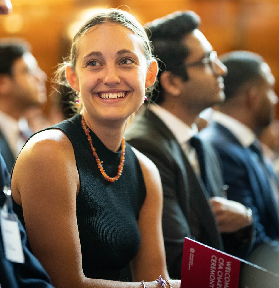 Woman smiling whilst staring 