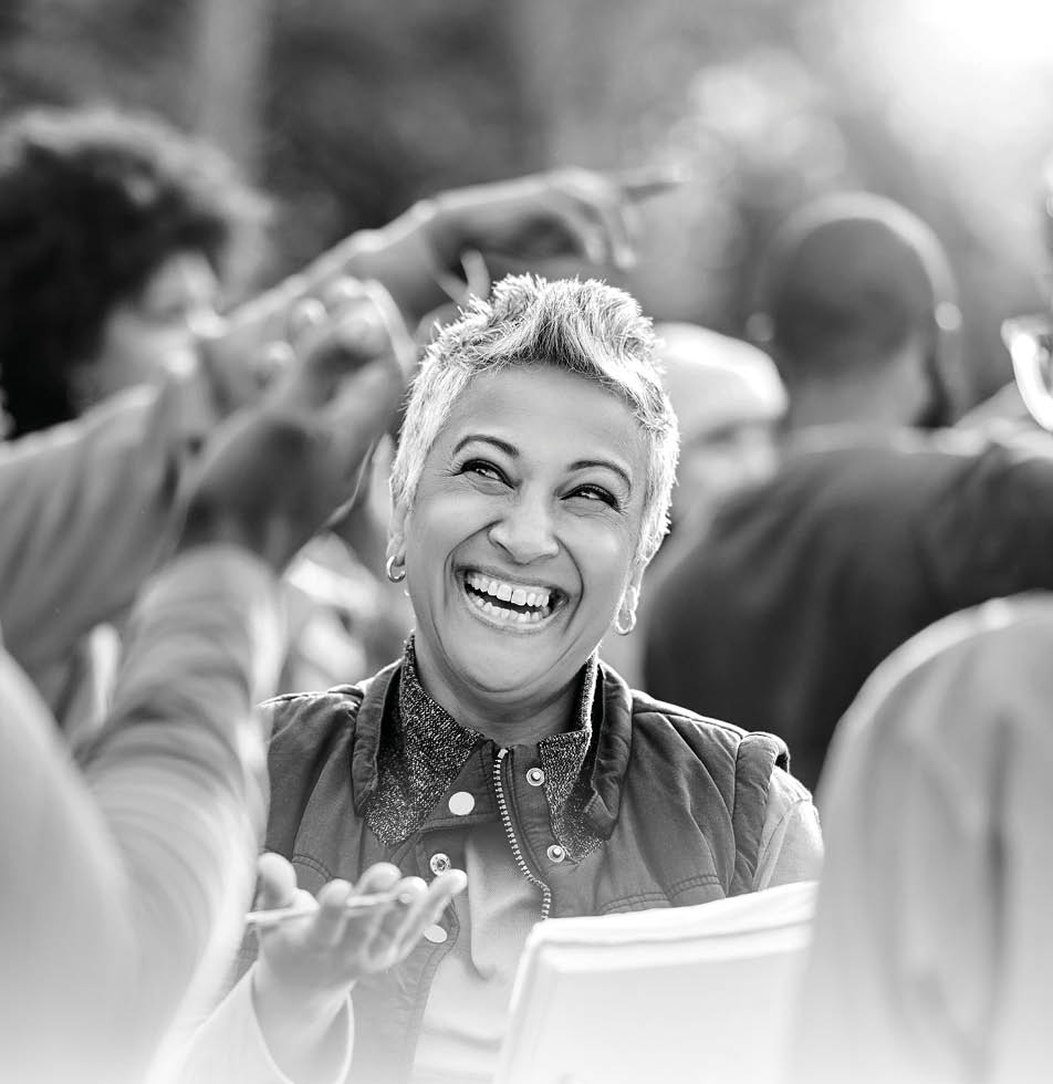 Lady smiling whilst talking 